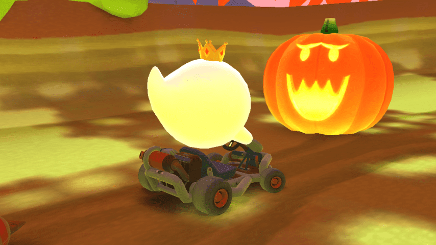 Re Boo di fronte a una zucca di Halloween | Mario Kart Tour